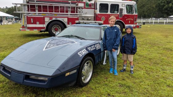 The kids check out the MSP Corvette